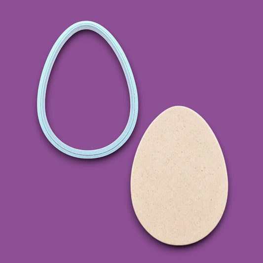 Egg Cookie Cutter  alongside a dough cutout – Oval-shaped baking tool for cookies, fondant, sandwiches, and crafts, available in multiple sizes and vibrant colors.