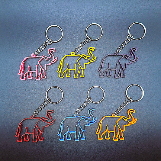 Front-facing view of six colorful elephant keychains, handmade in eco PLA plastic, perfect for animal lovers, party favors, or wildlife-themed gifts.