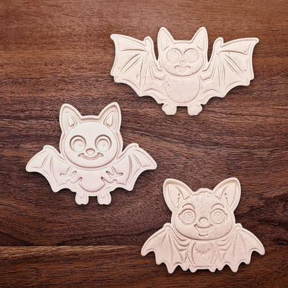 Bat cookie cutter dough cutouts and imprints, perfect for Halloween treats, fall party favors, and gifting. Customizable in 30 unique colors and made from eco-friendly materials.