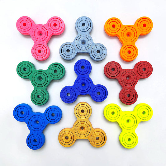 Customizable mini fidget and gyro spinners in various colors, great for ADHD, anxiety, stress, and focus. Perfect for gifting, party favors and classroom prizes.