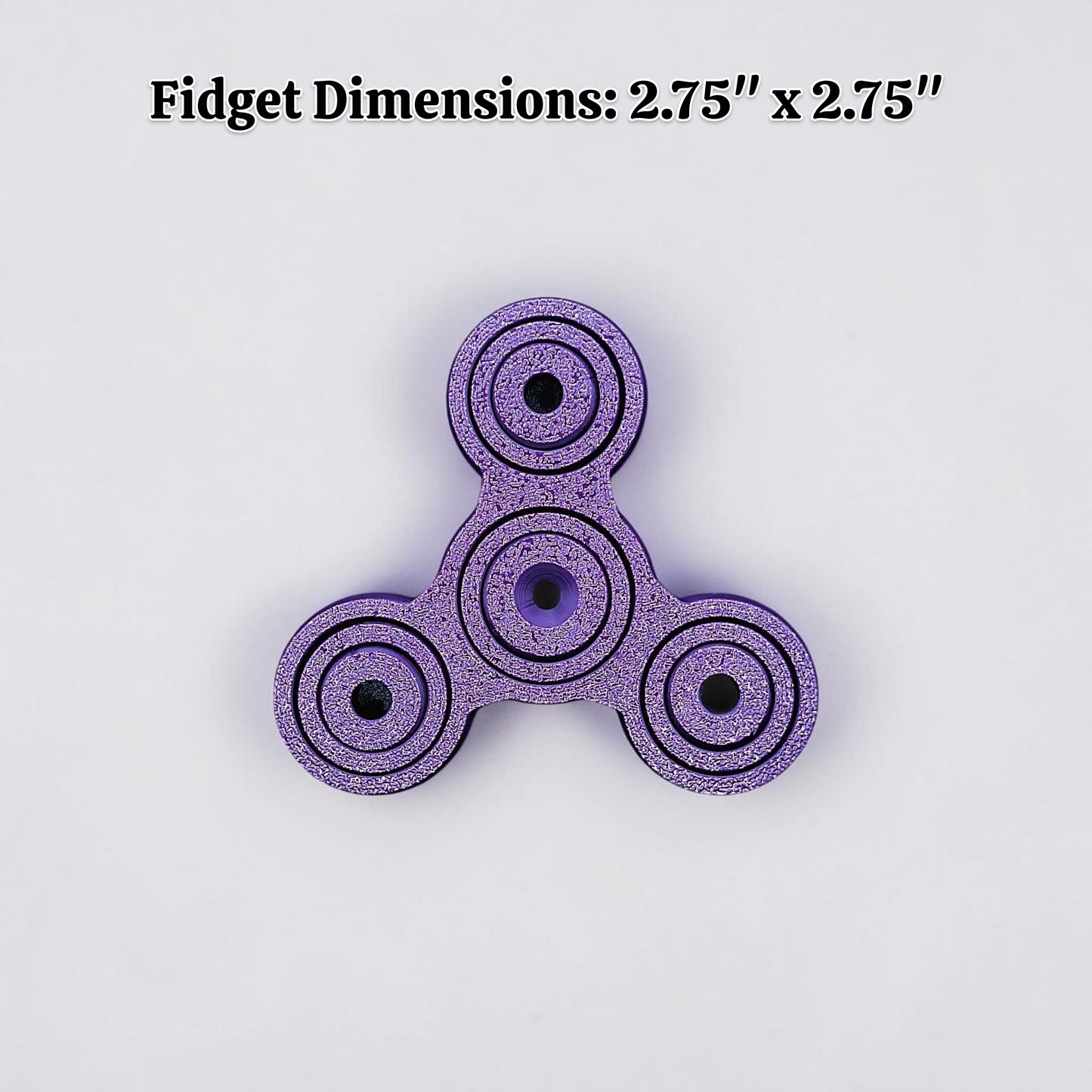 Purple fidget spinner with dimensions 2.75" x 2.75" on a light gray background
