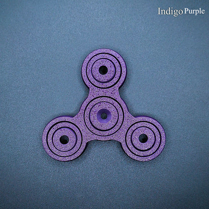 Indigo purple 3" fidget spinner with triple-prong design—perfect sensory tool for stress relief, focus, and calm. Durable, biodegradable, handmade.