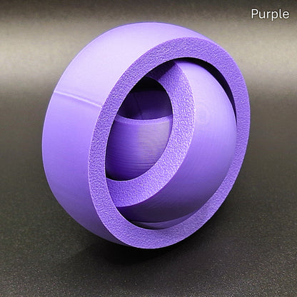 Purple smooth gyro spinner with a sleek, seamless exterior, made from biodegradable PLA for anxiety relief and quiet sensory play.