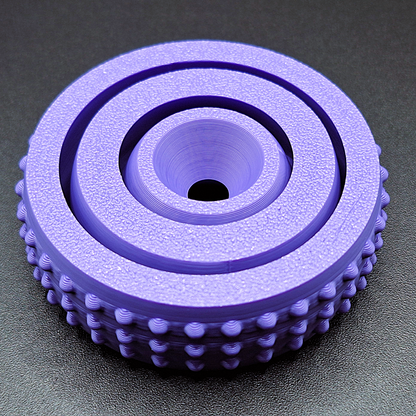 Top-down view of modern fidget spinner model, featuring rounded design and smooth center for easy spinning and stress relief in 3 sizes.