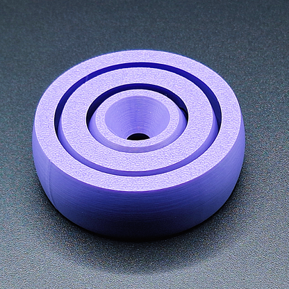 Top view of smooth-edge fidget spinner toy, designed for calming focus, handmade in the USA using sustainable, plant-based plastic.