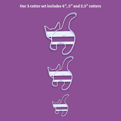 Three cat butt cookie cutters in sizes 4 inches, 3 inches, and 2.3 inches, arranged vertically on a solid purple background with white text at the top stating 'Our 3 cutter set includes 4", 3" and 2.3" cutters'.