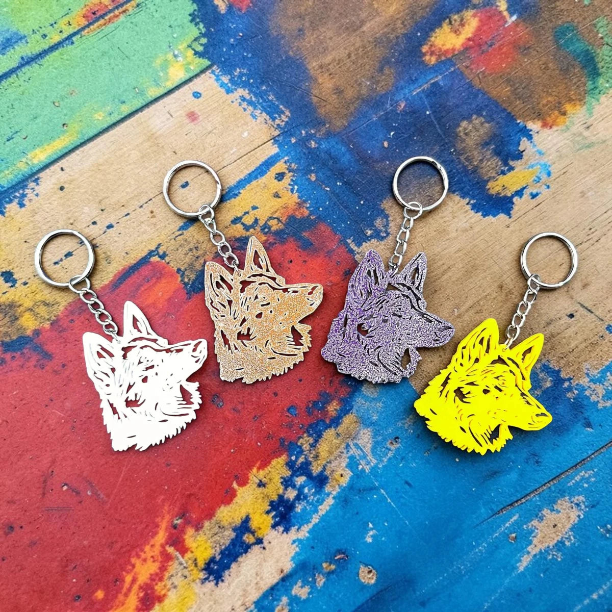 Customizable German Shepherd keychains in assorted colors, perfect for dog lovers, shelters and rescues.