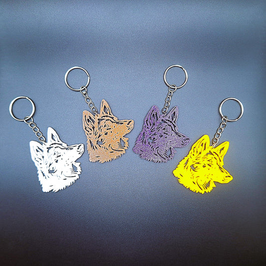 Four German Shepherd head keychains in assorted colors, handmade from PLA plastic, perfect for dog lovers, pet parents, or custom gifts.
