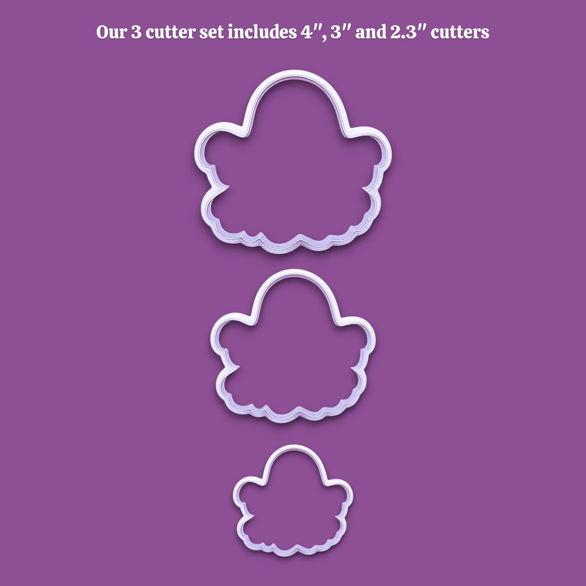 Three white ghost-shaped cookie cutters of decreasing sizes displayed vertically on a solid purple background, with white text at the top stating 'Our 3 cutter set includes 4", 3", and 2.3" cutters'.