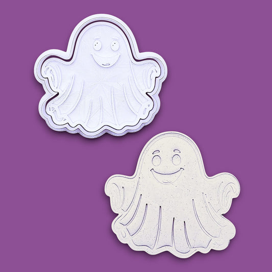 Handmade and customizable Halloween ghost cookie cutter and stamp alongside a dough cutout and imprint, great for easy fall cookie decorating and fun baking for school or family celebrations and trick or treats.