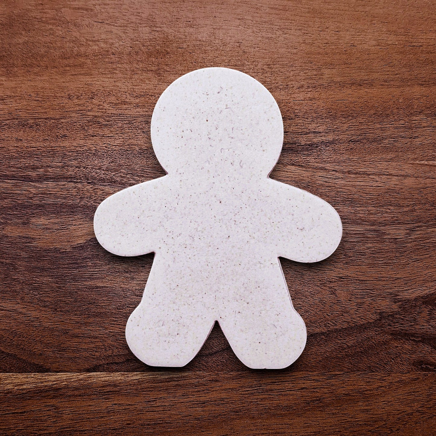 Baked gingerbread cookie cutout made with our festive gingerbread cookie cutter—perfect for holiday parties, Christmas treats, and winter baking fun.