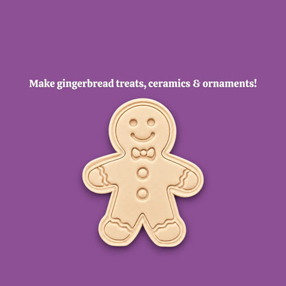 Holiday dough cutout with stamped gingerbread man design, ideal for Christmas cookies, fondant decorating, and festive baking with no piping needed.