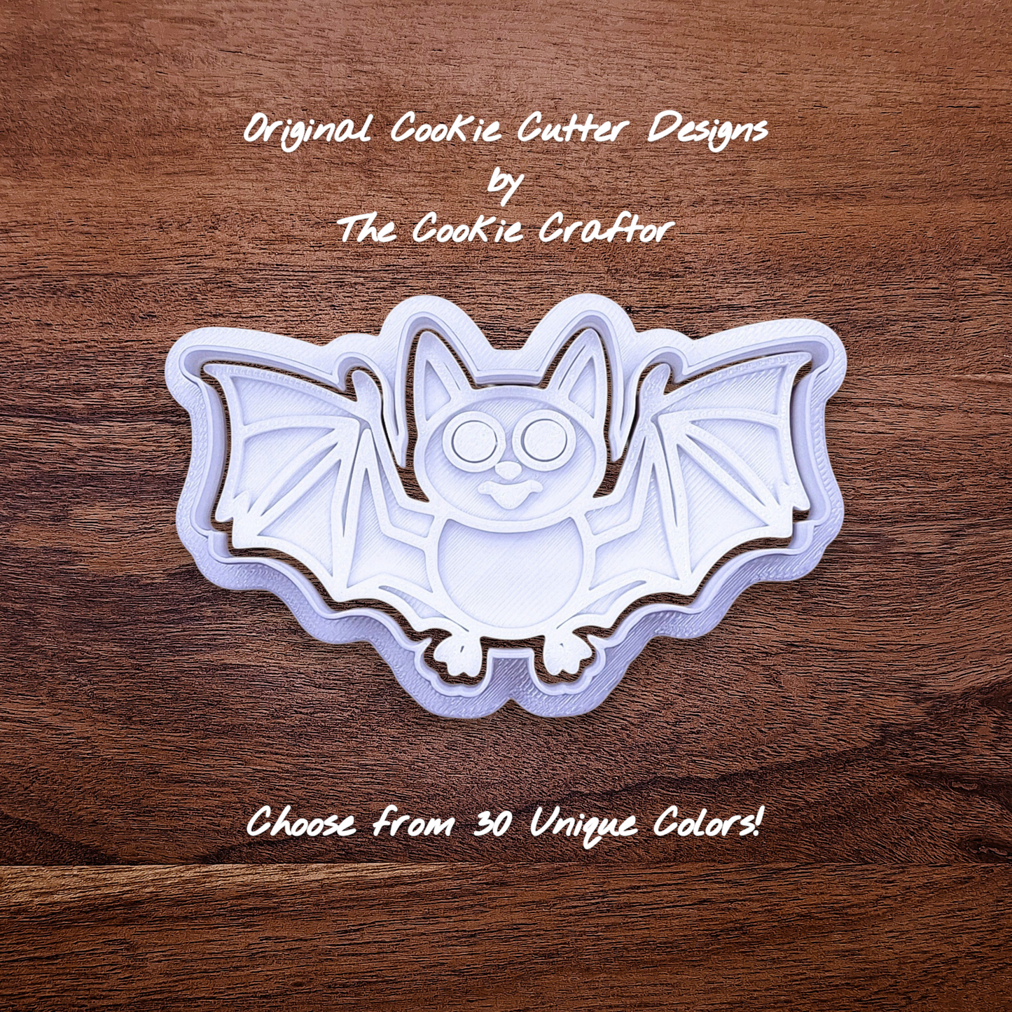 Bat cookie cutter with matching stamp, great for easy Halloween cookie decorating without icing.