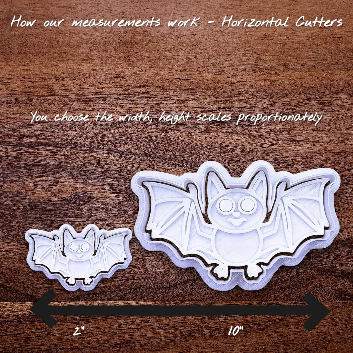 Halloween bat cookie cutters side by side to illustrate how sizing from 2 inches to 10 inches works.