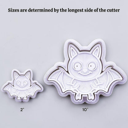 Two bat-shaped cookie cutters with sizes indicated on a light gray background, showing how size increases work.