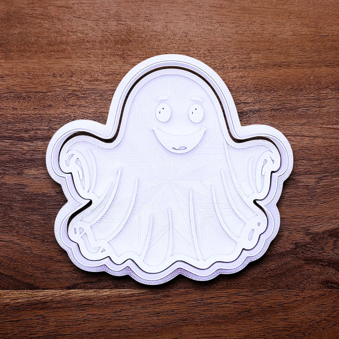 Handmade and customizable ghost cookie cutter and stamp, great for baking Halloween trick or treats or kid-friendly spooky snacks.