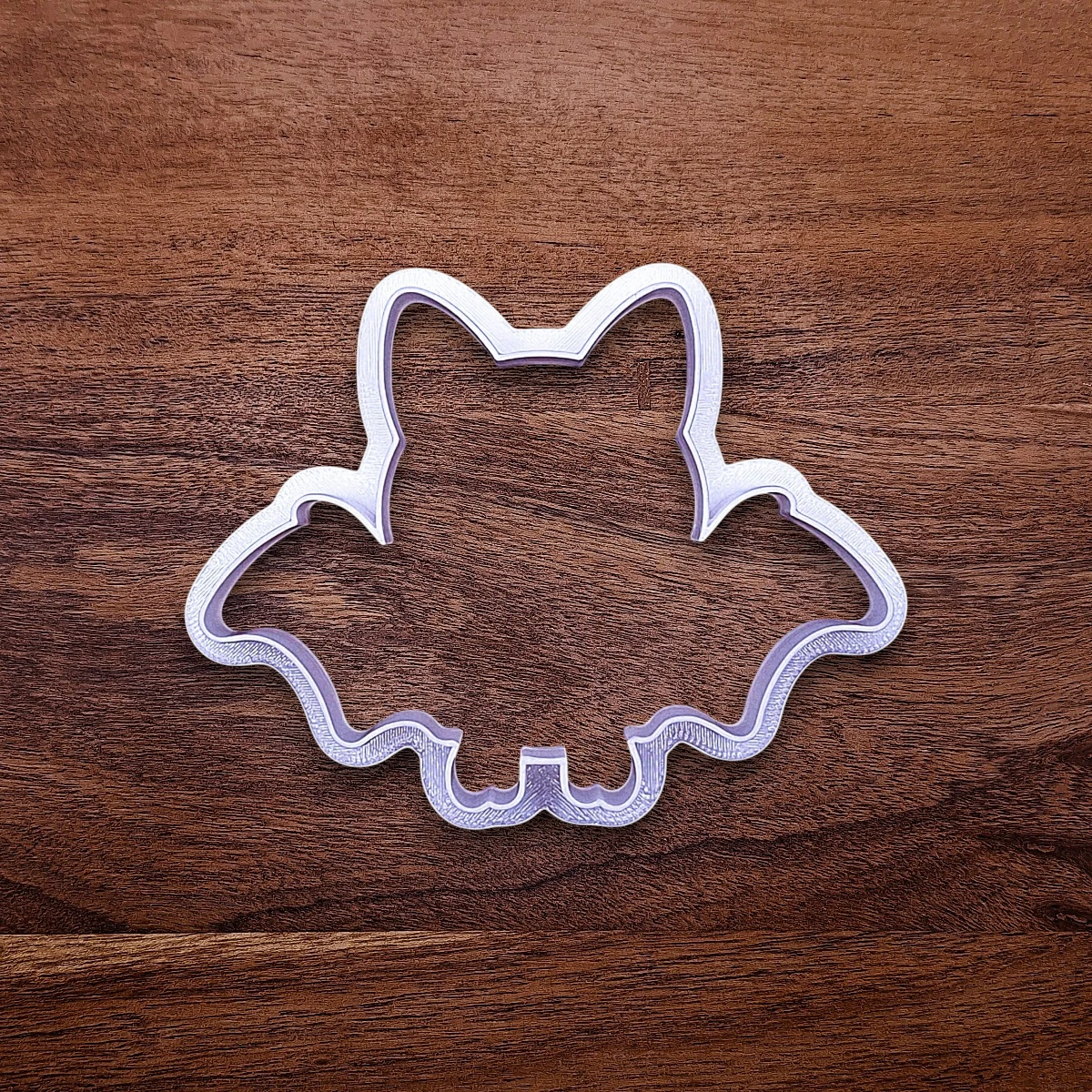 Bat cookie cutter, perfect for spooky Halloween cookies, fondant crafts, and gothic-themed baking projects.