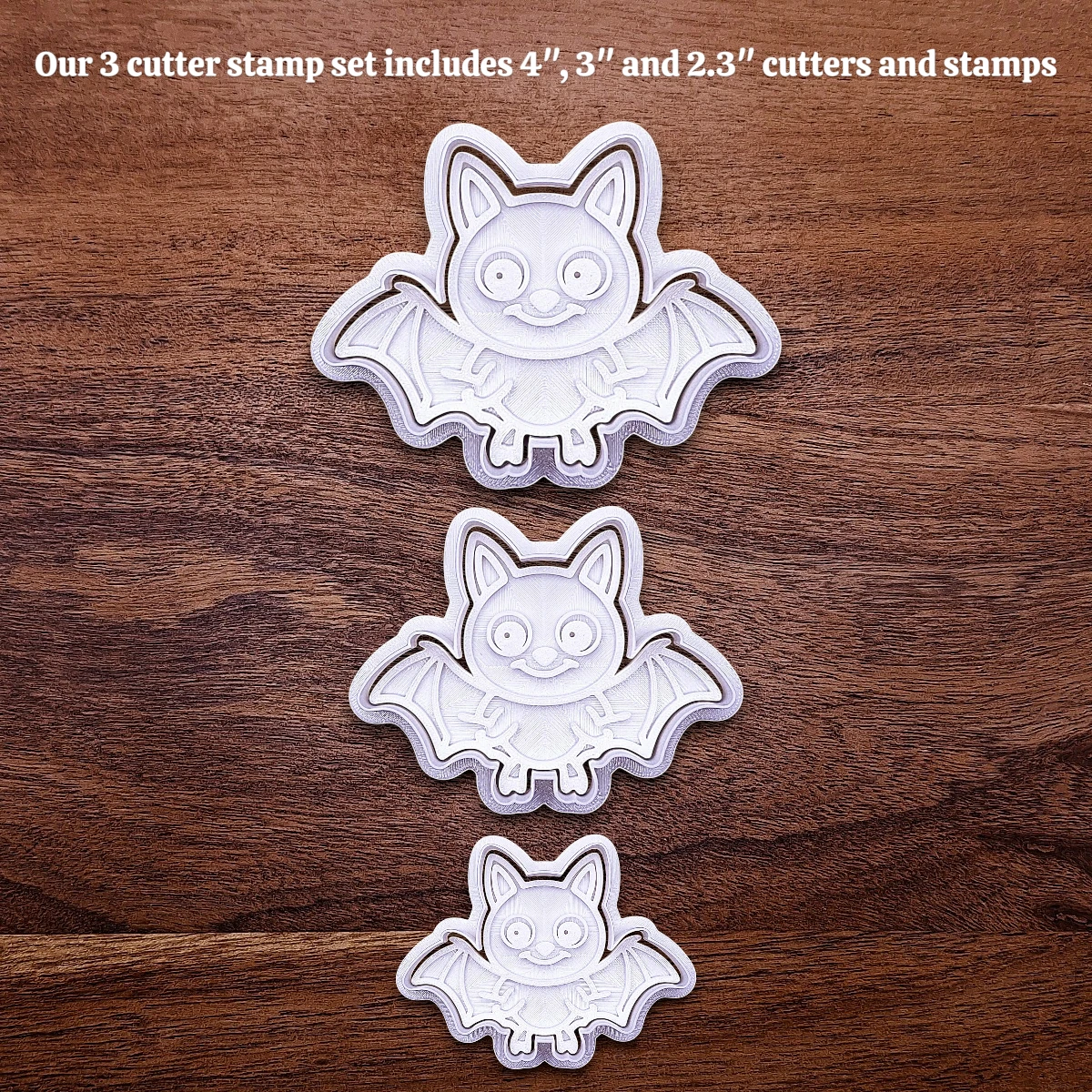 Bat cookie cutters with matching stamps, perfect for spooky Halloween cookies, fondant crafts, and gothic-themed baking projects.