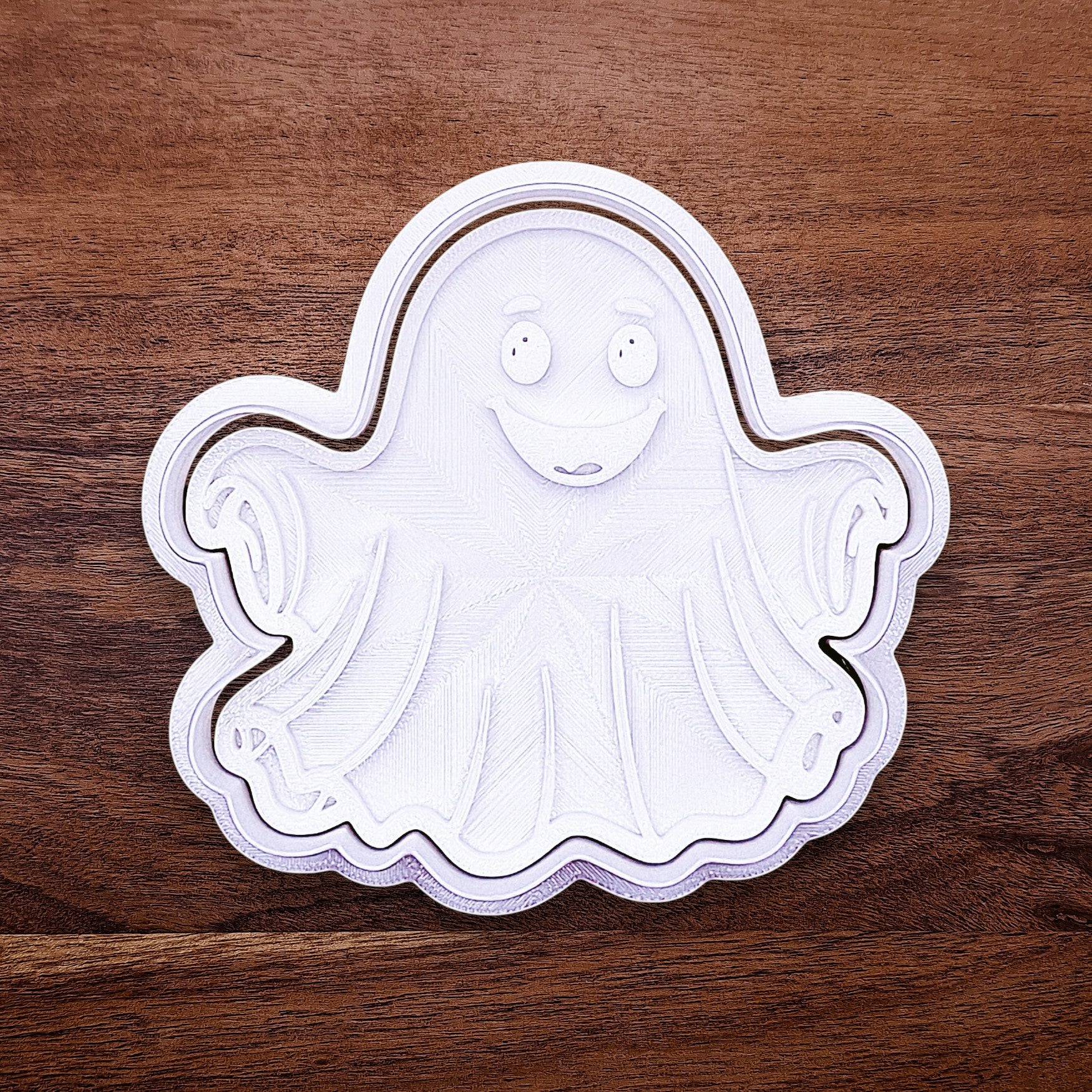 Halloween ghost cookie cutter and stamp combo. Great for easy decorating and fun fall baking for school or spooky family celebrations.