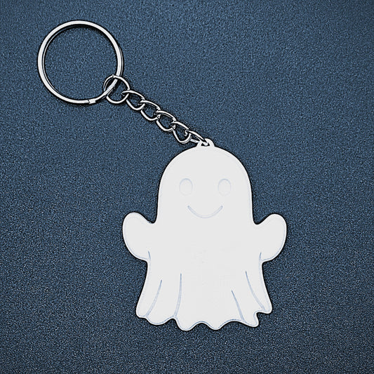 Single white ghost keychain—cute, spooky charm made from sustainable PLA plastic; ideal Halloween accessory, party favor, or zipper pull.