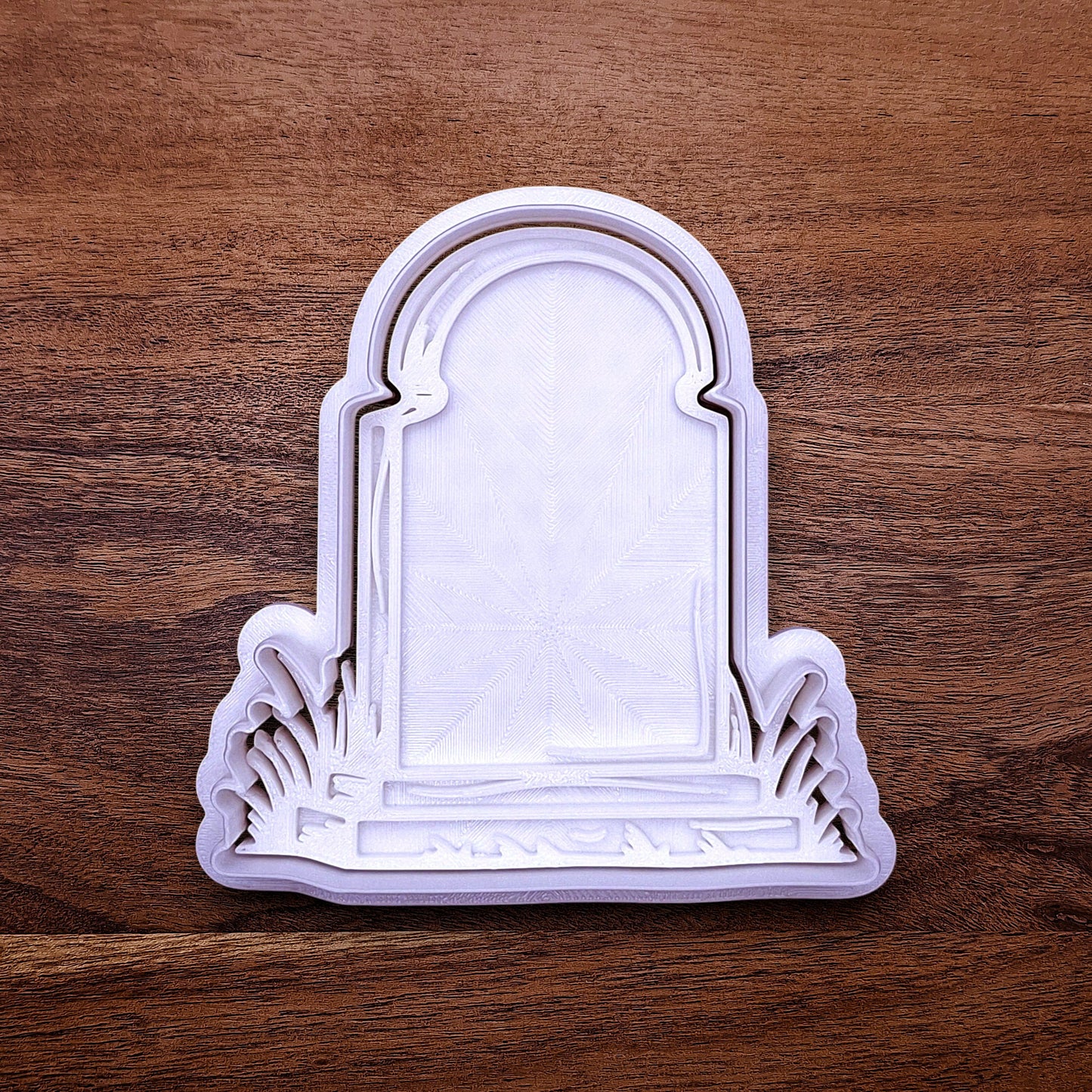 Gravestone cookie cutter and stamp for eerie, easy-to-decorate cookies or creepy fondant toppers.