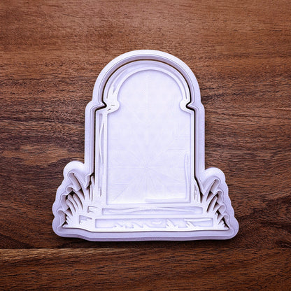 Gravestone cookie cutter and stamp for eerie, easy-to-decorate cookies or creepy fondant toppers.