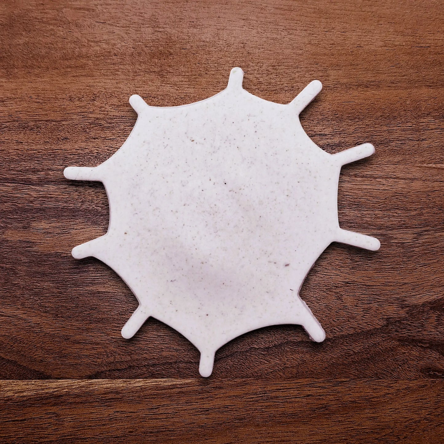 Handmade and customizable Halloween spiderweb cookie cutter dough cutout, perfect for fall parties, events, trick or treats, and gifting.