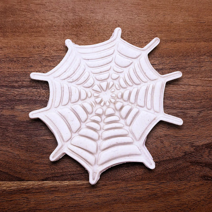 Handmade and customizable Halloween spiderweb dough cutout and imprint, perfect for fall parties, events, trick or treats, and gifting.