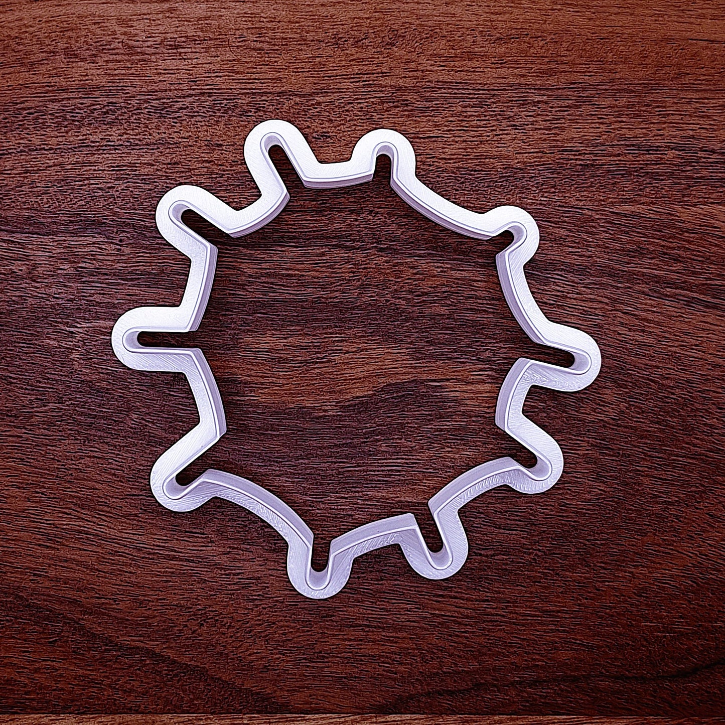 Spiderweb cookie cutter without stamp. Great for classic Halloween shapes in cookies or crafts.