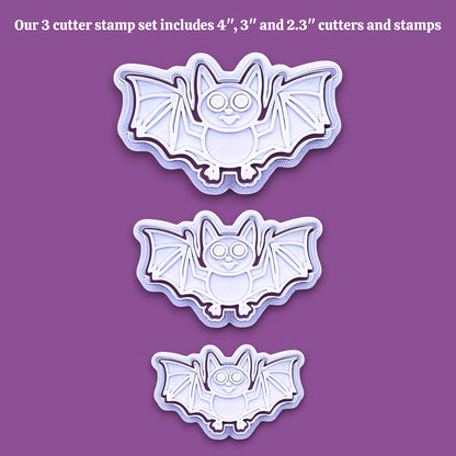 Three bat-shaped cookie cutters in different sizes displayed vertically on a solid purple background, with white text at the top stating 'Our 3 cutter stamp set includes 4", 3", and 2.3" cutters and stamps'.