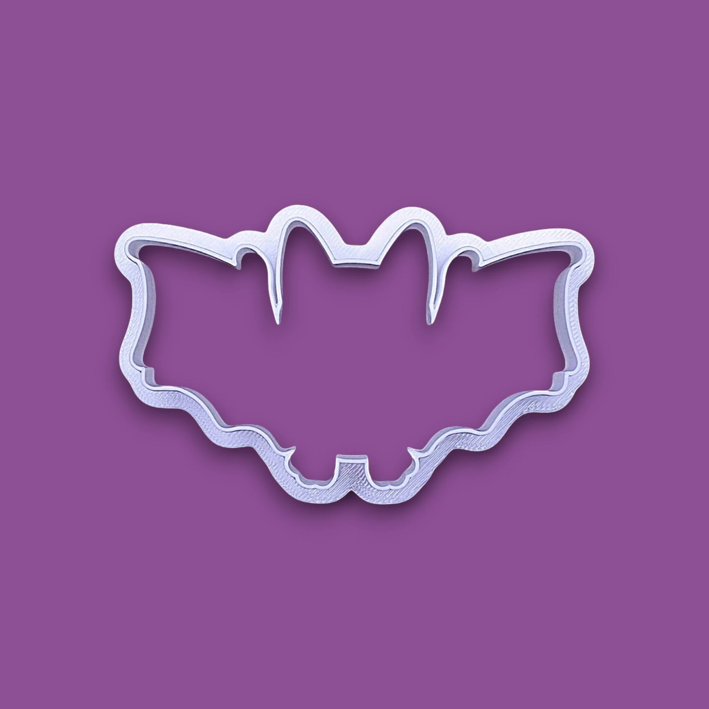 Bat-shaped cookie cutter, great for Halloween baking, haunted house parties, and bat-themed cookie trays or crafts.