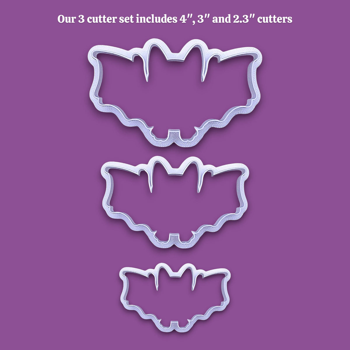 Three bat-shaped cookie cutters in sizes 4 inches, 3 inches, and 2.3 inches, shown as white plastic outlines on a solid purple background with white text at the top stating 'Our 3 cutter set includes 4", 3" and 2.3" cutters'