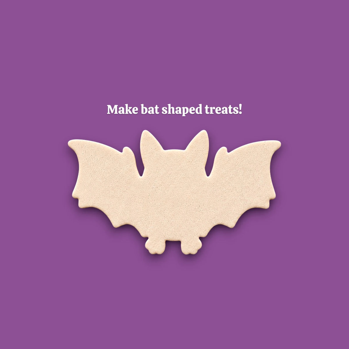 Close-up of bat cookie cutout showing wing and body design made with bat cookie cutter.