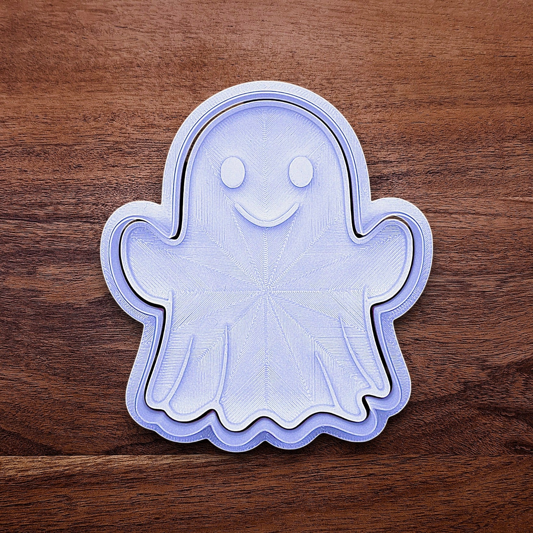 Ghost cookie cutter with stamp – adds spooky face details for Halloween cookies, fondant toppers, or fall baking fun.
