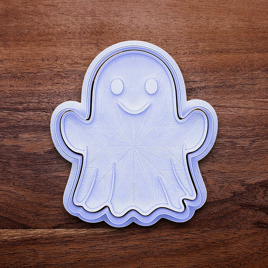 Ghost cookie cutter with stamp – adds spooky face details for Halloween cookies, fondant toppers, or fall baking fun.