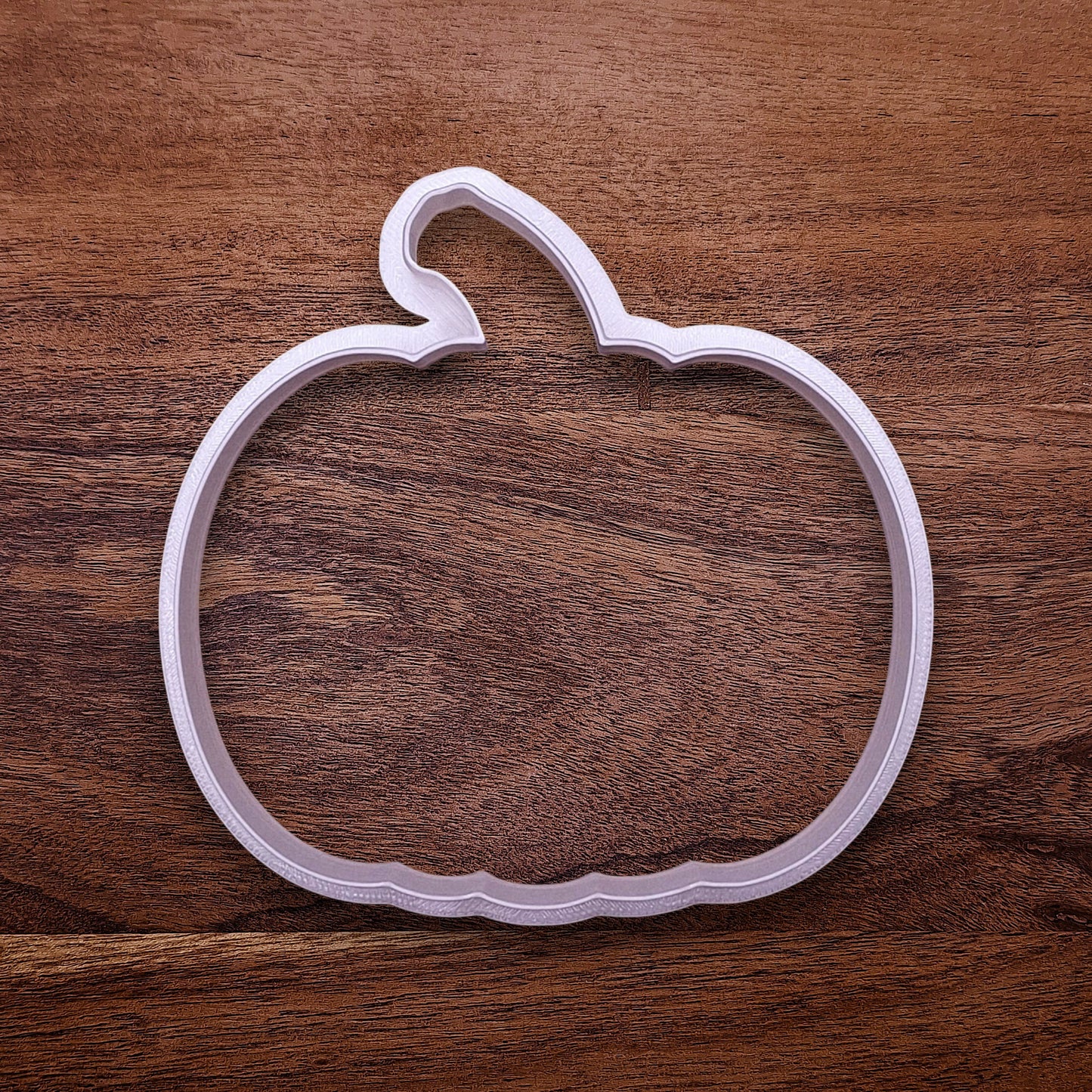 Standalone pumpkin cookie cutter with bold shape. Perfect for baking big autumn cookies, decorating pies, or crafting with fondant or clay.