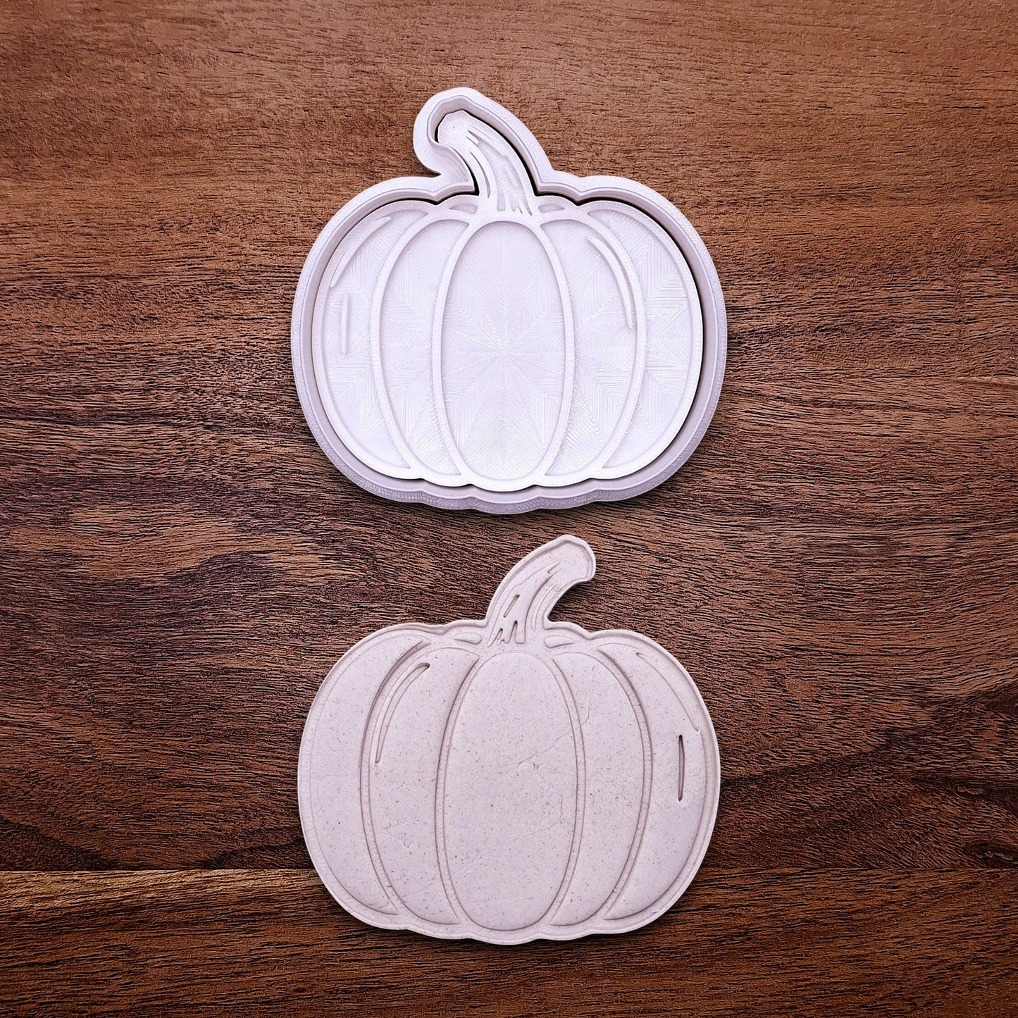 Pumpkin cookie cutter with matching stamp for detailed fall treats. Great for cookies, fondant, pie decorations, and festive baking projects.
