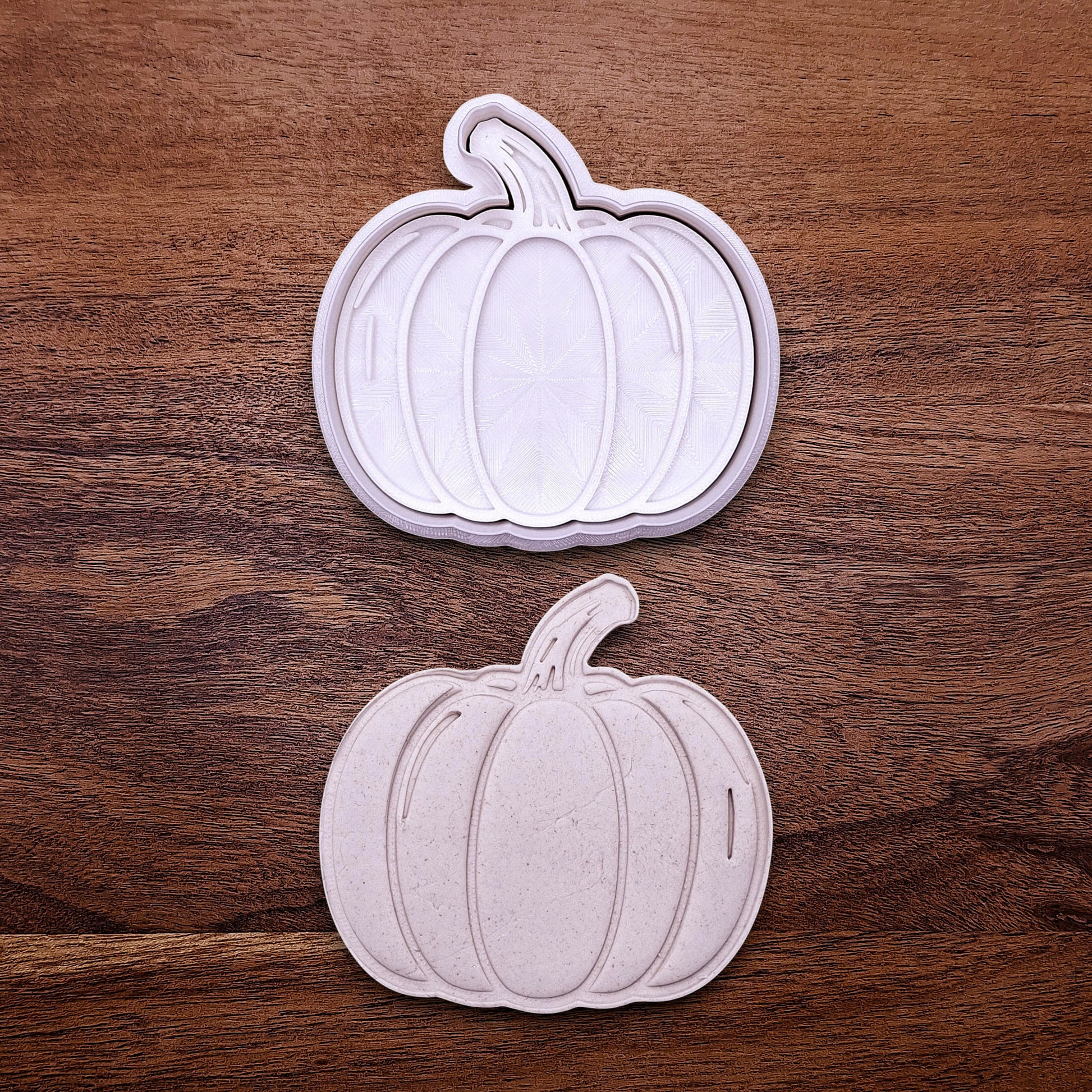 Pumpkin cookie cutter with matching stamp for detailed fall treats. Great for cookies, fondant, pie decorations, and festive baking projects.