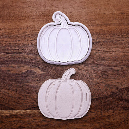 Pumpkin cookie cutter with matching stamp for detailed fall treats. Great for cookies, fondant, pie decorations, and festive baking projects.