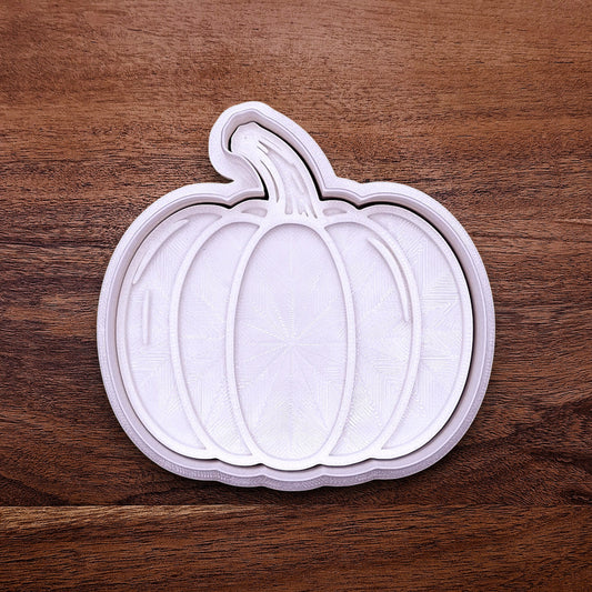 Pumpkin cookie cutter with matching stamp for detailed fall treats. Great for cookies, fondant, pie decorations, and festive baking projects.