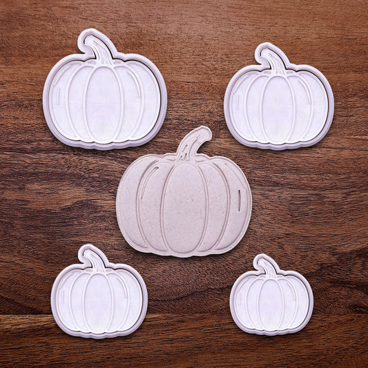 Pumpkin cookie cutters with matching stamps for detailed fall treats. Great for cookies, fondant, pie decorations, and festive baking projects.
