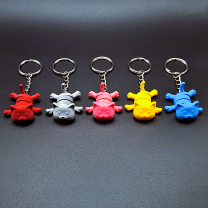Five eco-friendly articulated cat keychains in front view, great for keys, backpacks, and small gifts with charm.