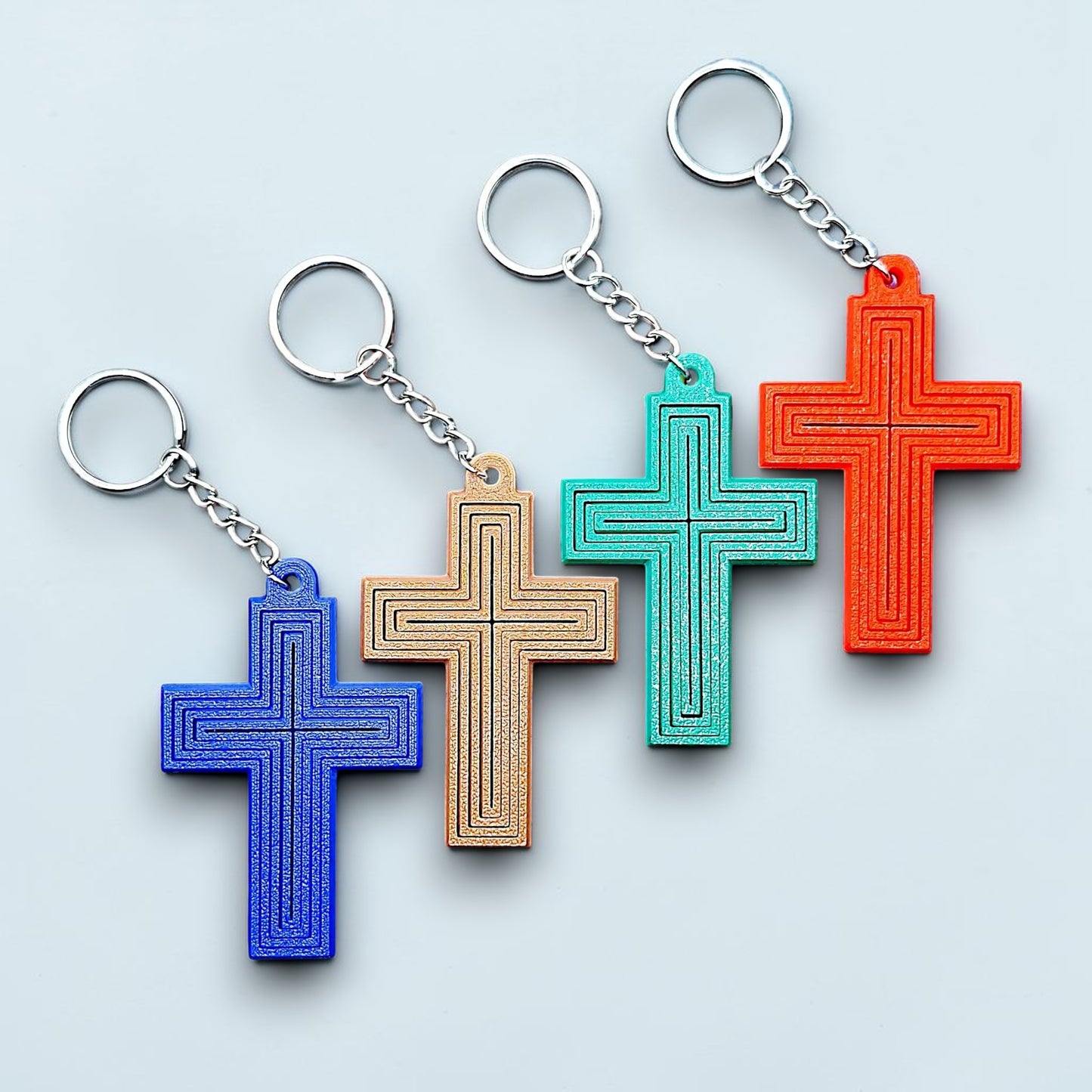 Handmade and customizable articulated cross keychains, ideal for personalized gifts, church events, VBS, and faith-based accessories.