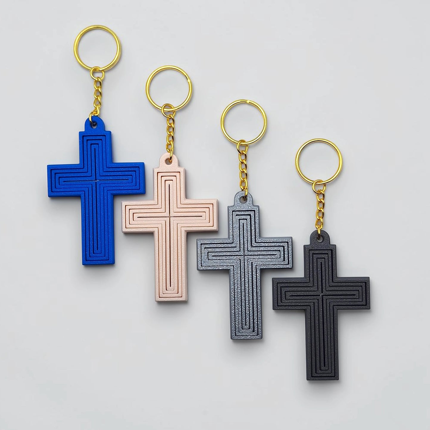 Customizable articulated cross keychains in unique colors, ideal for personalized gifts, church events, VBS, and faith-based accessories.