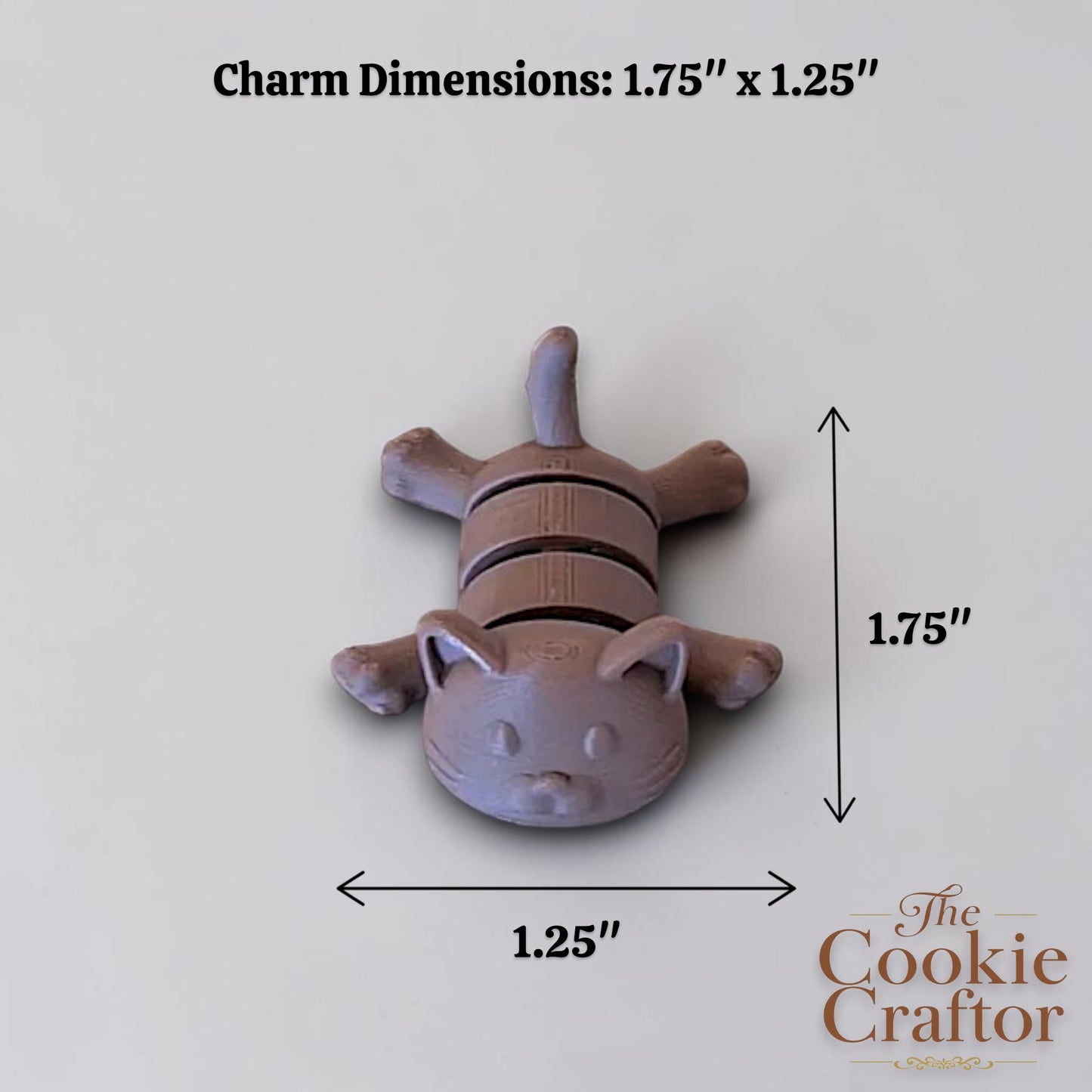 Cat-shaped charm with dimensions labeled on a light gray background