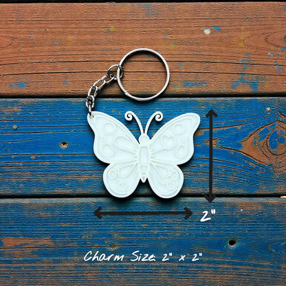Handmade and customizable butterfly keychain, perfect for gifts, party favors, or nature-themed accessories.