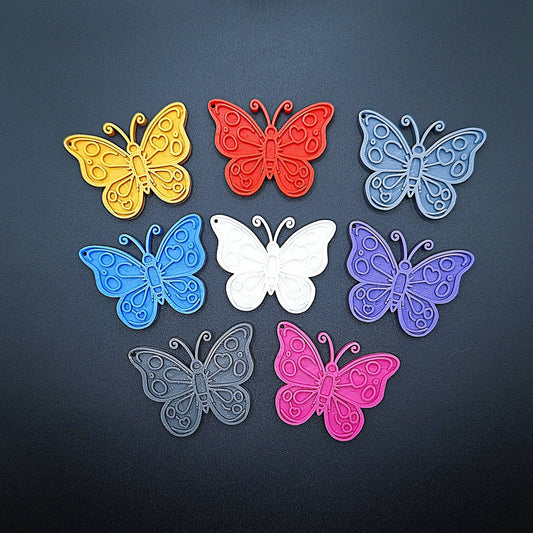 Butterfly keychain set in eight colors—handmade, eco-friendly insect charms perfect for gifts, party favors, or nature-themed accessories.