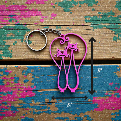 Handmade and customizable cat couple keychain in magenta, perfect for couples, best friends, or pet lovers.