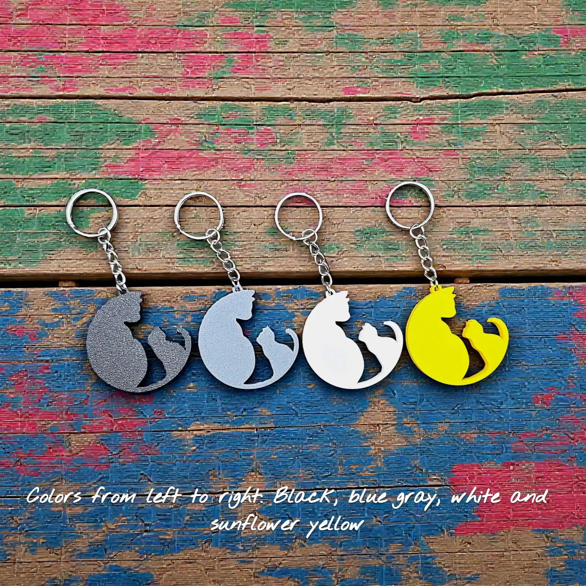 Handmade and customizable cat and kitten keychains in unique colors, perfect for pet parents, gift sets and animal rescues.