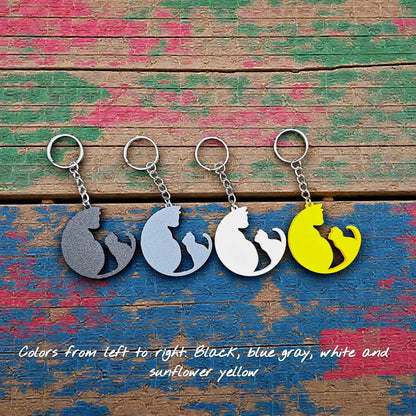 Handmade and customizable cat and kitten keychains in unique colors, perfect for pet parents, gift sets and animal rescues.